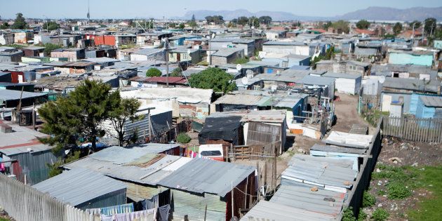 Shacks are seen at an informal settlement near Cape Town on 14 September 2016. A process of 'upgrading' enables each shack in an informal settlement to receive basic services of water, electricity and sanitation.