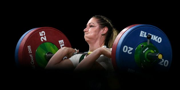 Mona Pretorius of South Africa lifts on the way to winning the bronze medal in the women's 63kg weightlifting.