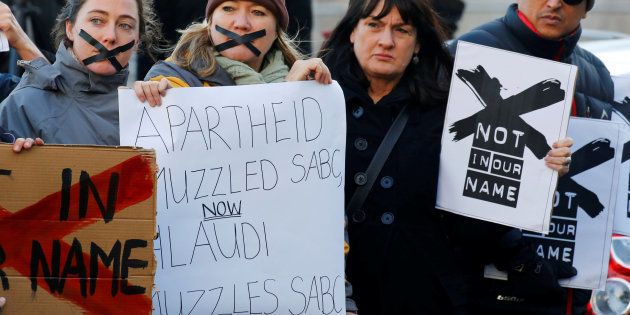 Demonstrators protest against the decision by public broadcaster the South African Broadcasting Corporation (SABC) that it would not broadcast scenes of violent protest, in Cape Town on 1 July 2016.