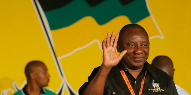 Cyril Ramaphosa (R) celebrates his election as party deputy president at the national conference of the ruling African National Congress in Bloemfontein on 18 December 2012.