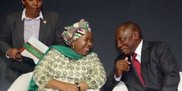 Head of the African Union (AU) Dr Nkosazana Dlamini Zuma (L) chats with South African Deputy President Cyril Ramaphosa (R) during the plenary session of the XIV World Forestry Congress on September 7, 2015 in Durban, South Africa.