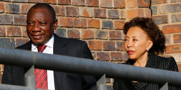 South African Deputy President Cyril Ramaphosa (L) arrives with his wife Dr Tshepo Motsepe at the Farlam Commission, in Centurion, outside Pretoria August 11, 2014.