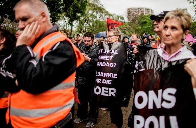 Members AfriForum and other civil society groups march to the Union Buildings to protest farm attacks. November 25, 2017. Several civil rights organisations and opposition parties took part in a protest march to the Union Buildings to hand over a memorandum to the state president, to demand the prioritisation of farm murders. / AFP PHOTO / GIANLUIGI GUERCIA (Photo credit should read GIANLUIGI GUERCIA/AFP/Getty Images)