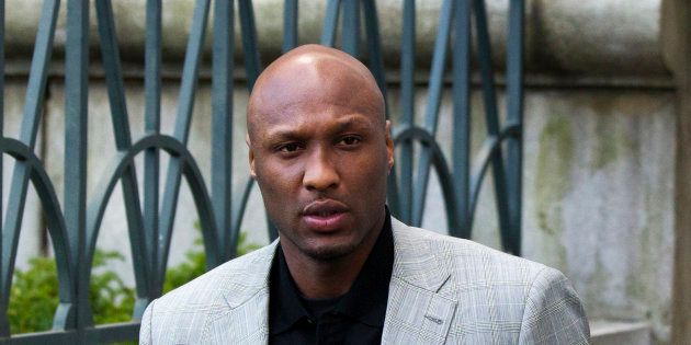 Basketball player Lamar Odom departs the New York state Supreme Court after a child custody hearing with his ex-girlfriend, Liza Morales, in Manhattan March 5, 2013. REUTERS/Lucas Jackson (UNITED STATES - Tags: CRIME LAW SPORT)