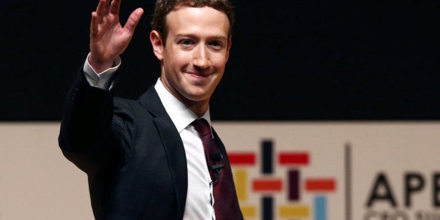 Facebook founder Mark Zuckerberg waves to the audience during a meeting of the APEC (Asia-Pacific Economic Cooperation) Ceo Summit in Lima, Peru, November 19, 2016. REUTERS/Mariana Bazo