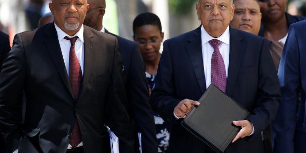 South African Finance Minister Pravin Gordhan and Deputy Finance Minister Mcebisi Jonas arrive for the 2017 Budget Speech at Parliament in Cape Town, South Africa, February 22, 2017. REUTERS/Mike Hutchings