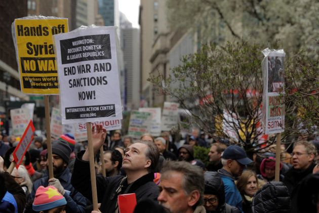 Anti-war demonstrators take part in a protest in New York City, U.S., April 15, 2018.