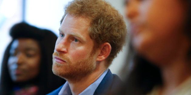 Britain's Prince Harry listens to a seminar for members of staff during a visit to The Mix in London, December 19, 2016. REUTERS/Alastair Grant/Pool