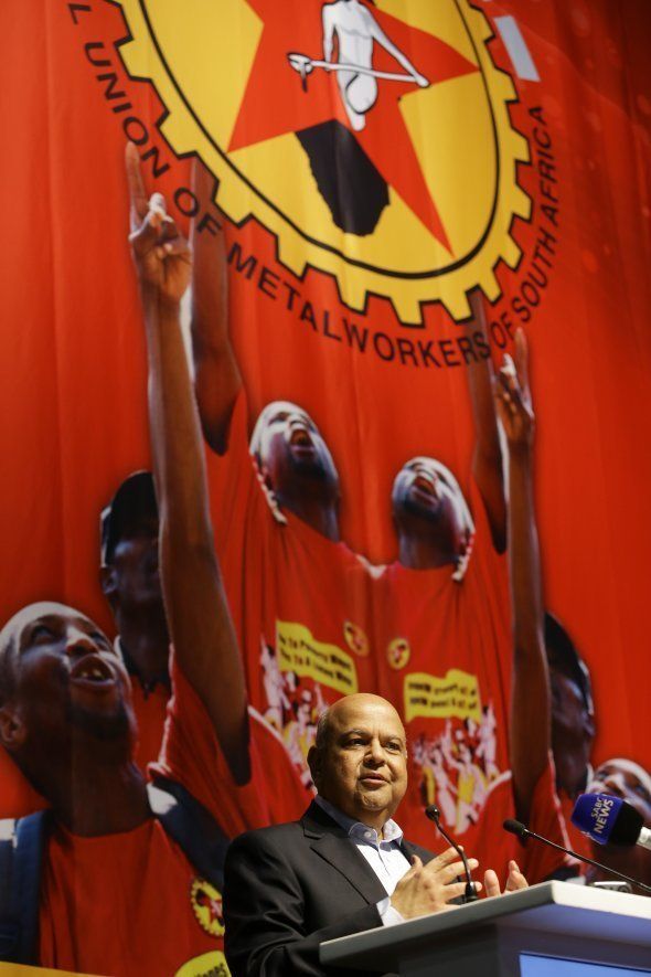 Minister of Finance Pravin Gordhan addresses the audience during the 10th national congress of the National Union of Metalworkers of South Africa at the Cape Town International Convention Centre (CTICC) on December 12, 2016 in Cape Town, South Africa.