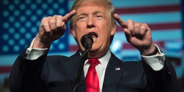 TOPSHOT - President-elect Donald Trump speaks at the USA Thank You Tour 2016 at the Giant Center on December 15, 2016 in Hershey, Pennsylvania.