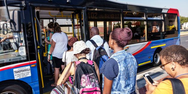 South Africa, Cape Town, MyCiTi bus stop passengers boarding.