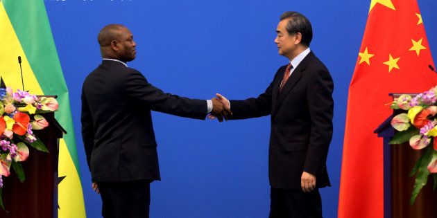 China's Foreign Minister Wang Yi and Sao Tome and Principe's Foreign Minister Urbino Botelho in Beijing, China, on December 26, 2016.