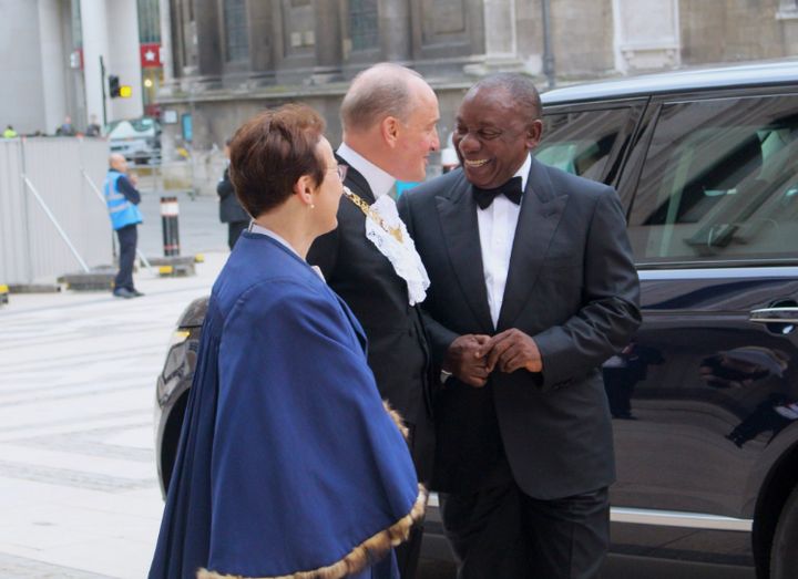 Charles Bowman, Lord Mayor of the City of London, and Catherine McGuinness, policy head of the City of London, welcome President Ramaphosa to the Guildhall on Wednesday.