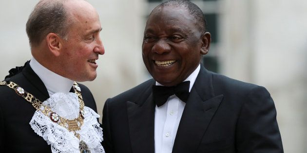 President Cyril Ramaphosa greets the Lord Mayor of London Charles Bowman as he arrives to attend the Commonwealth Business Forum Banquet at the Guildhall in London, Britain, April 17, 2018.