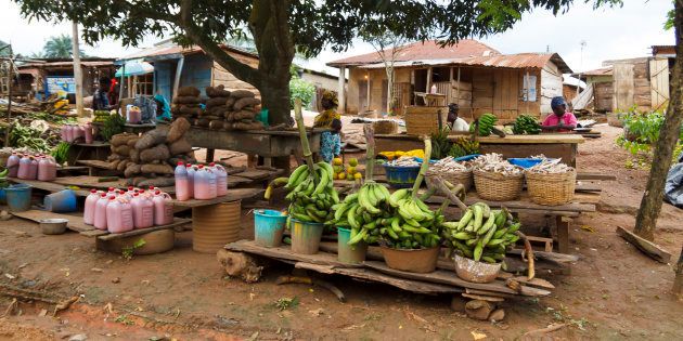 Local fruit market in the street, where people sell local fresh fruit in a village at Ondo state in Nigeria, on September 30, 2012.