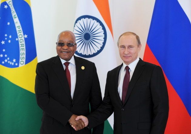 Russian President Vladimir Putin (R) shakes hands with South African President Jacob Zuma during the BRICS leaders meeting ahead of the G20 summit in Antalya, Turkey, November 15, 2015.