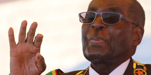 Zimbabwe's President Robert Mugabe gestures as he addresses a gathering in a speech to mark the National Heroes Day celebrations in the capital Harare, Zimbabwe August 8, 2016.