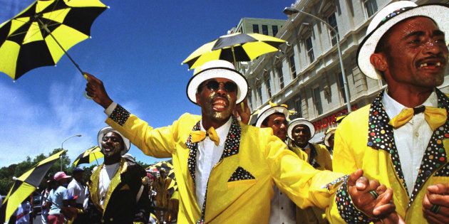 Revellers celebrate in the streets of Cape Town at the annual minstrels' carnival on January 2. The carnival, which dates back to the slave era, features troupes of brightly adorned minstrels who attempt to out-sing, out-dance and generally out-party each other for the coveted Frames Trophy.