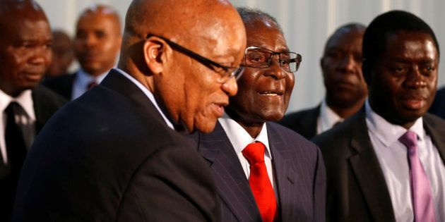 South African President Jacob Zuma (L) gestures as he hosts his Zimbabwean counterpart, President Robert Mugabe during the 2nd Session of the South Africa-Zimbabwe Bi-National Commission in Pretoria this week.