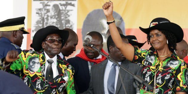 President Robert Mugabe (L) and his wife Grace Mugabe (R)