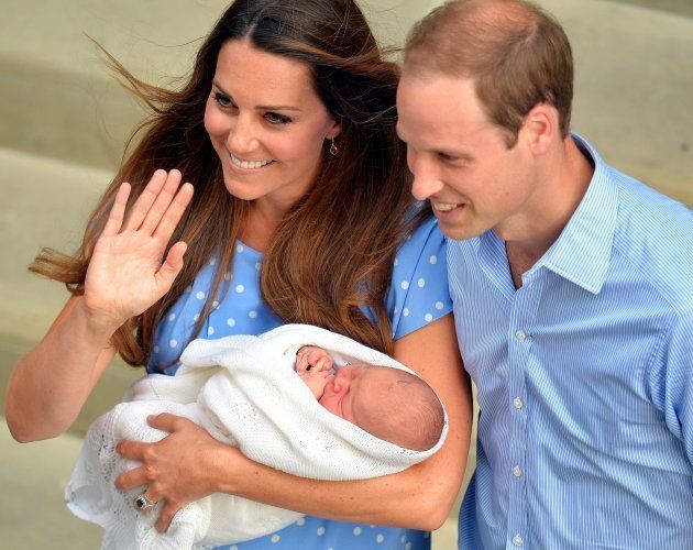 File photo dated 23/07/13 of the Duke and Duchess of Cambridge with their son Prince George of Cambridge as the royal couple will be waiting on tenterhooks to see if their new baby is a boy or a girl Ð as they do not know their childÕs gender.