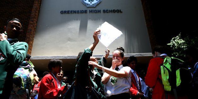 Matric pupils Roxanne celebrate with each other after completing final exams on November 28, 2016 in Johannesburg, South Africa. Greenside High School matric pupils celebrated outside the school premises after they wrote their final exam paper, Afrikaans.