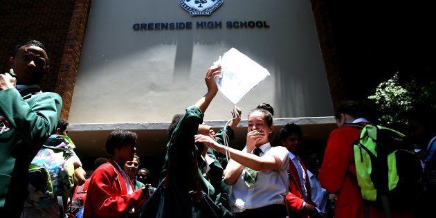 Matric pupils celebrate with each other after completing final exams on November 28, 2016 in Johannesburg.