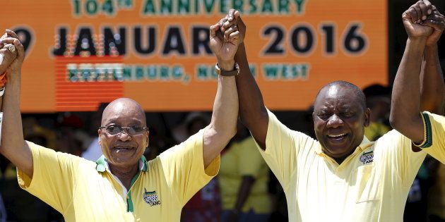South Africa's President Jacob Zuma (L), who is also the president of the ruling party, the African National Congress (ANC), gestures next to his Deputy President Cyril Ramaphosa during the party's 104th anniversary celebrations in Rustenburg January 9, 2016. REUTERS/Siphiwe Sibeko