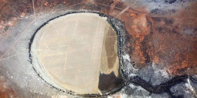 Cultivated agricultural ground can be seen amongst drought affected farmland in south Australia.