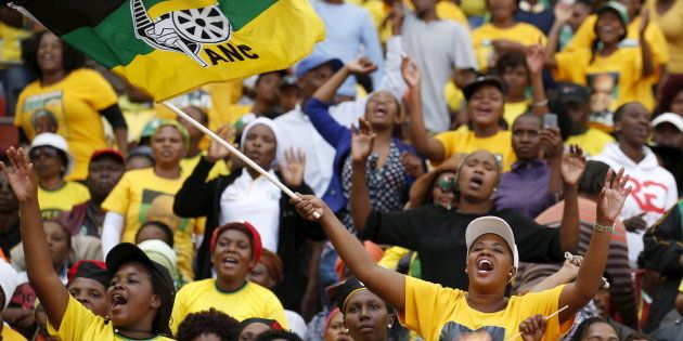 Supporters of South African President Jacob Zuma's ruling African National Congress (ANC) cheer at a rally to launch the ANC's local government election manifesto in Port Elizabeth, April 16, 2016. REUTERS/Mike Hutchings