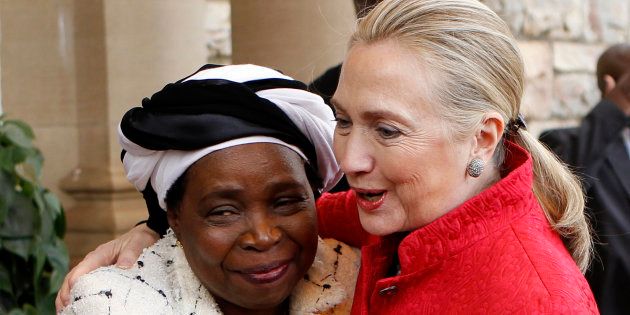 Outgoing Chair of the AU Commission Nkosazana Dlamini-Zuma welcomes Former U.S. Secretary of State Hillary Clinton during a courtesy visit in Pretoria August 7, 2012.