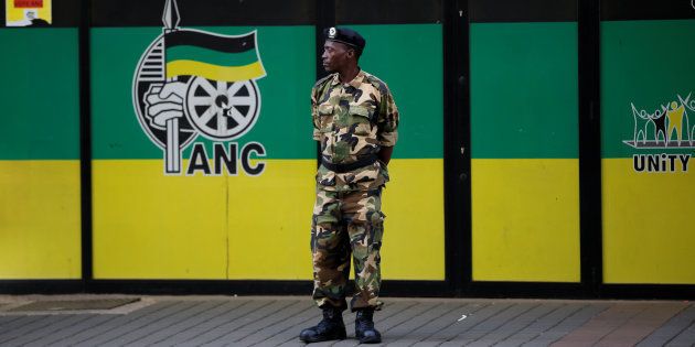 A member of the Umkhonto we Sizwe Military Veterans Association stands guard at ANC headquarters in downtown Johannesburg, South Africa.