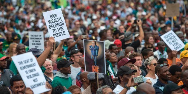 Tens of thousands of South Africans from various political and civil society groups march to the Union Buildings to protest against South African president and demand his resignation on April 7, 2017 in Pretoria.