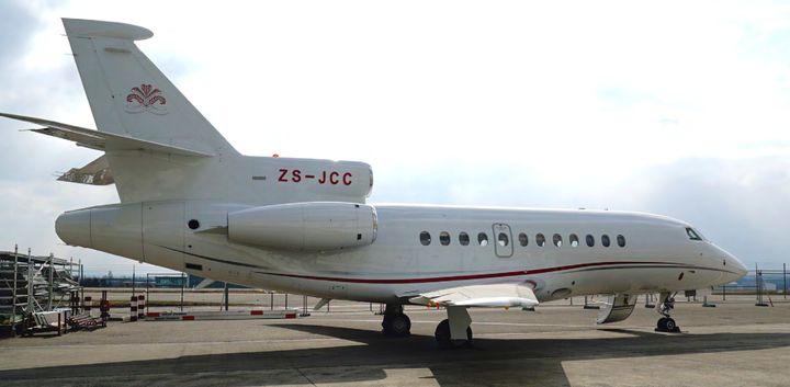 Christo Wiese's 2000 Dassault Falcon 900C. The insignia on the tail is the same as Lourensford Wine Estate's emblem. The estate is also owned by Wiese.