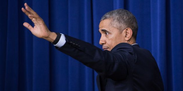 President Barack Obama leaves the stage, after speaking at the My Brother's Keeper Summit, in the South Court Auditorium of the Eisenhower Executive Office Building of the White House in Washington, DC on December 14, 2016. (Photo by Cheriss May/NurPhoto via Getty Images)