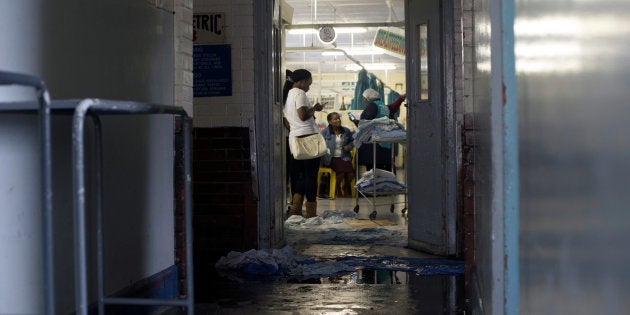 Blankets are used to stop water entering a ward at King Edward VIII Hospital during a storm in Durban, South Africa October 10, 2017.