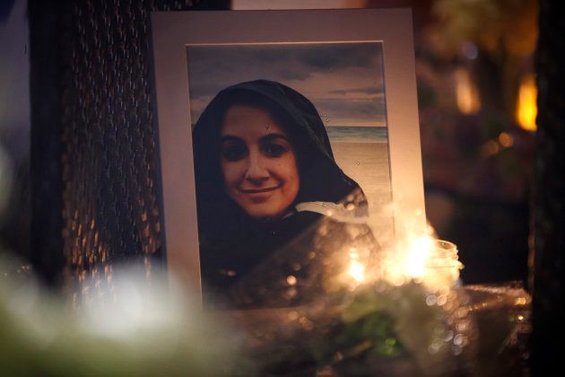 A photograph of Anne Marie D'Amico is shown at a vigil on April 24, 2018 in Toronto.