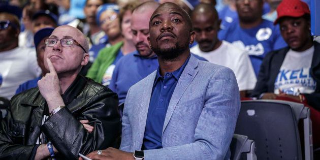 DA leader Mmusi Maimane (R) is pictured during the policy decision session at the federal congress in Pretoria on April 8, 2018.