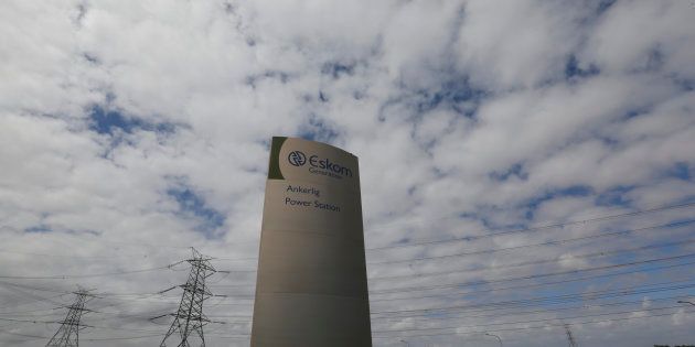 Pylons carry electricity from a sub-station of state power utility Eskom outside Cape Town in this picture taken March 20, 2016. REUTERS/Mike Hutchings