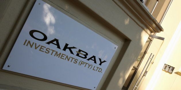 A logo of Oakbay Investments is seen at the entrance of their offices in Sandton, outside Johannesburg, South Africa April 13, 2016.