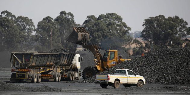 Coal is loaded onto a truck at the Woestalleen colliery near Middleburg in Mpumalanga province, September 8, 2015.