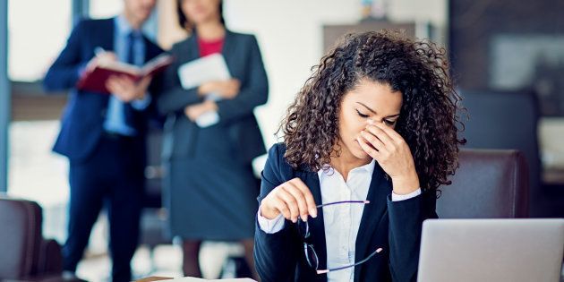 Burnout businesswoman under pressure in the office