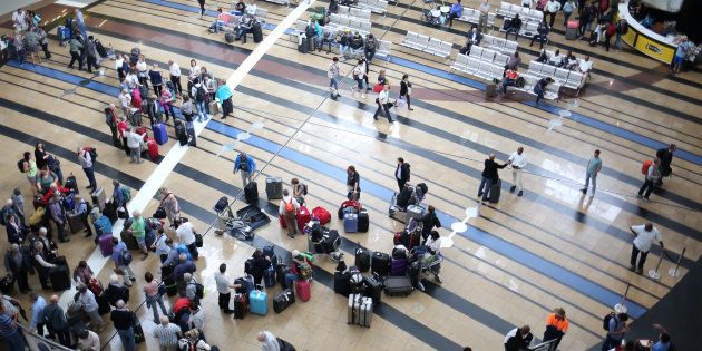 Passengers are seen at the OR Tambo International Airport in Johannesburg, South Africa, March 8, 2017. REUTERS/Siphiwe Sibeko