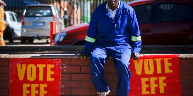 An Economic Freedom Fighters (EFF) supporter during the party's election campaign visit in Cullinan on July 28, 2016 in Tshwane, South Africa. Malema promised the voters land and title deeds.