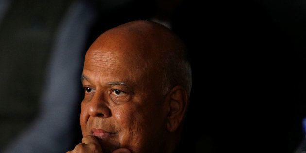 Former Finance Minister Pravin Gordhan reacts as African National Congress Youth League members interrupt a memorial service for anti-apartheid activist Ahmed Kathrada in Durban, South Africa, April 9, 2017. REUTERS/Rogan Ward