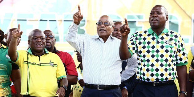 African National Congress (ANC) KZN Provincial Chairperson; Sihle Zikalala, President Jacob Zuma, and ANC Treasury General Zweli Mkhize sing during the party's KZN 105-years anniversary celebration at KwaDukuza recreational grounds on January 15, 2017 in KwaZulu-Natal, South Africa.