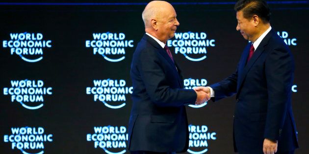 Klaus Schwab, Founder and Executive Chairman of the WEF (L) shakes hand with Chinese President Xi Jinping during the World Economic Forum (WEF) annual meeting in Davos, Switzerland January 17, 2017.