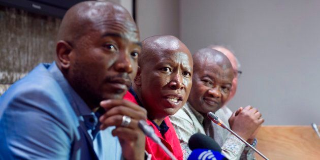 EFF leader Julius Malema (2nd L) speaks flanked by DA leader Mmusi Maimane (L), United Democratic Movement leader Bantu Holomisa (2nd R) and Corne Mulder (R) of the Freedom Front Plus (FF+).