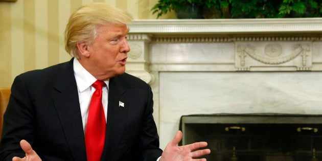 President Barack Obama listens to President-elect Donald Trump in the White House Oval Office on Nov. 10, 2016.