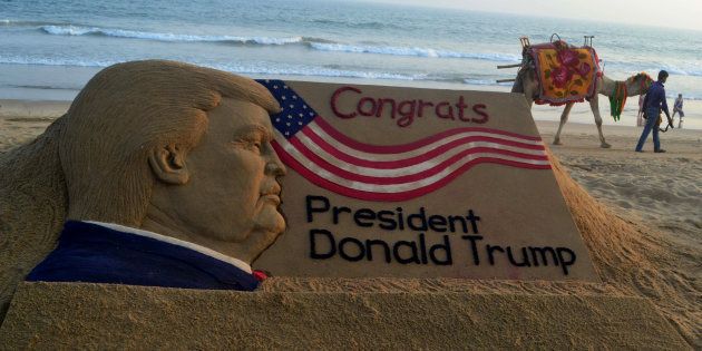 A sand sculpture of U.S. President-elect Donald Trump is seen at the Bay of Bengal Seas beach at Puri, on January 19, created by sand artist Sudarshan Pattnaik, ahead of his oath-taking ceremony on Thursday.